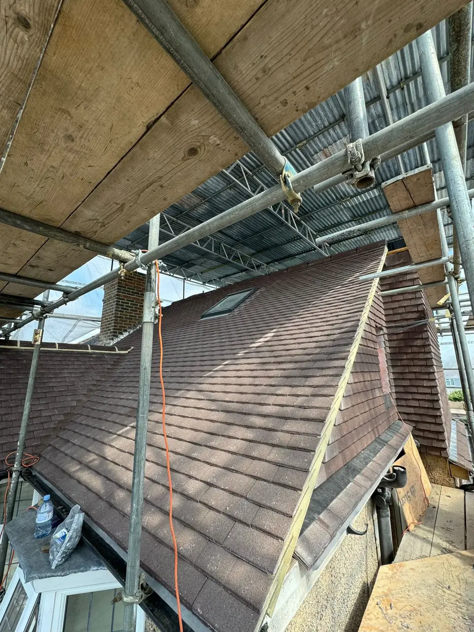 Completed tiled roof after installation by Roofers of Surrey