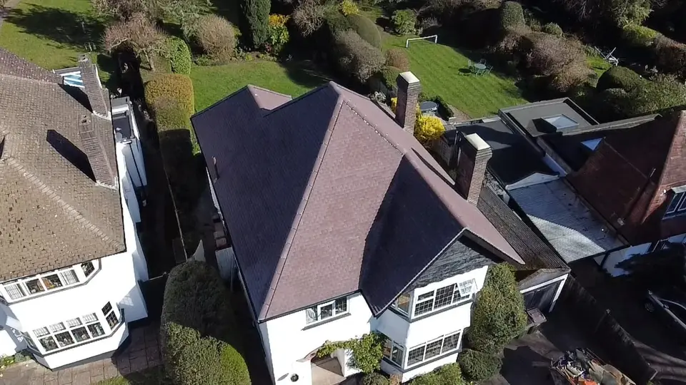 Full re-roof with new tiles by Roofers of Surrey